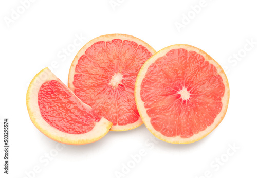 Slices of juicy grapefruit on white background