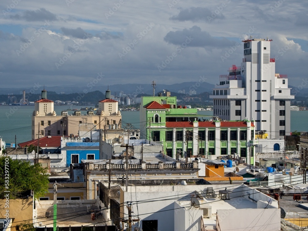Looking over Old San Juan and the Bahía de San Juan, as cruise ships arrive at the cruise ship port.