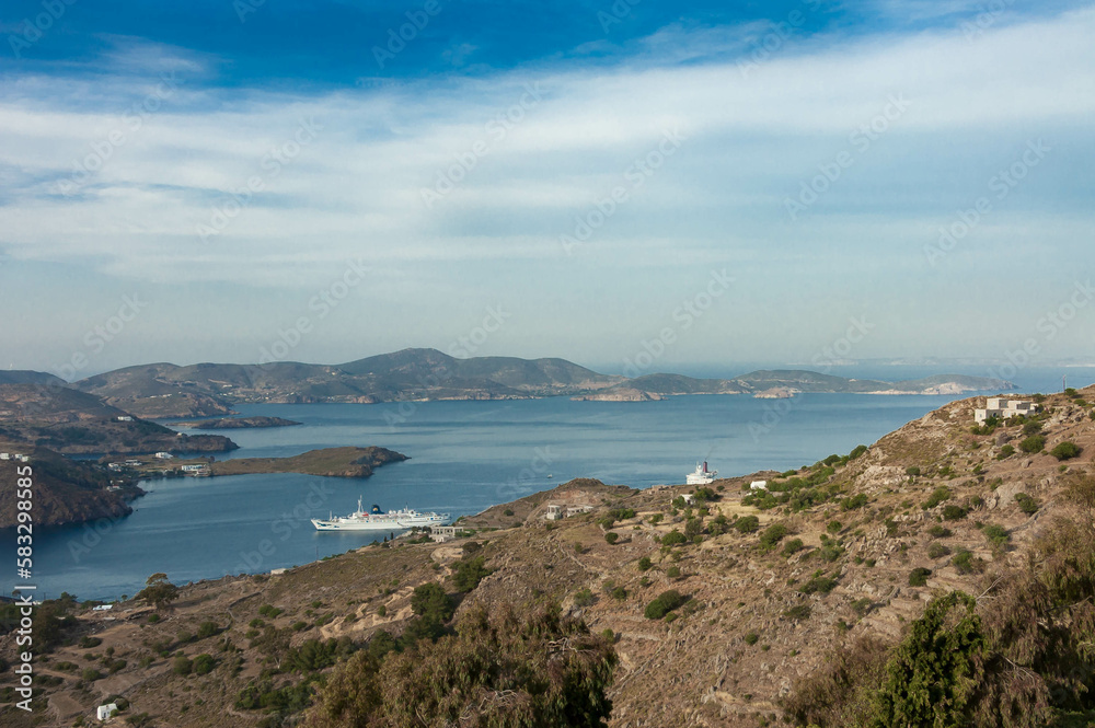 view of Patmos island from Chora with cruise ship entering into port, Dodecanese island, Greece view of Patmos island from Chora with cruise ship entering into port, Dodecanese island, Greece