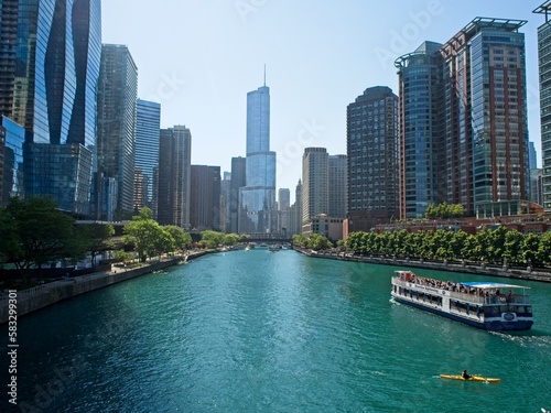 High rises loom above the Chicago River, forming a man-made canyon of buildings © Andrew