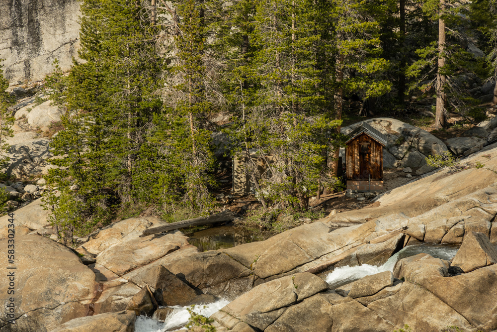 Small Storage Cabin Along Waterfall Into Glen Aulin High Sierra Camp in Yosemite Small Storage Cabin Along Waterfall Into Glen Aulin High Sierra Camp in Yosemite