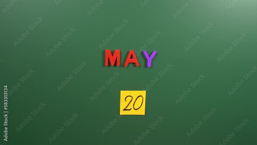 Hand sticking a sticker 20 May calendar day on school board. 20 date of May. Twentieth day of May. 20th date number. 20 day calendar. Twenty date. World Bee, Cameroon National, World Metrology Hand sticking a sticker 20 May calendar day on school board. 20 date of May. Twentieth day of May. 20th date number. 20 day calendar. Twenty date. World Bee, Cameroon National, World Metrology