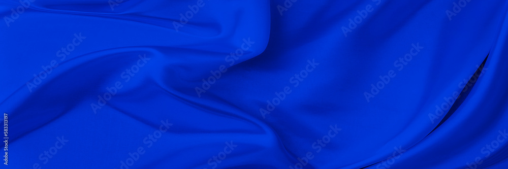 Black blue satin dark fabric texture luxurious shiny that is abstract silk cloth background with patterns soft waves blur beautiful. Black blue satin dark fabric texture luxurious shiny that is abstract silk cloth background with patterns soft waves blur beautiful.