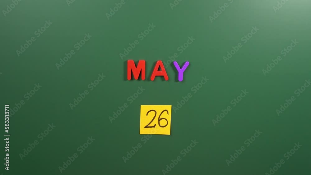 Hand sticking a sticker 26 May calendar day on school board. 26 date of May. Twenty sixth day of May. 26th date number. 26 day calendar. Twenty six date. Georgia independence, Independence of Guyana Hand sticking a sticker 26 May calendar day on school board. 26 date of May. Twenty sixth day of May. 26th date number. 26 day calendar. Twenty six date. Georgia independence, Independence of Guyana