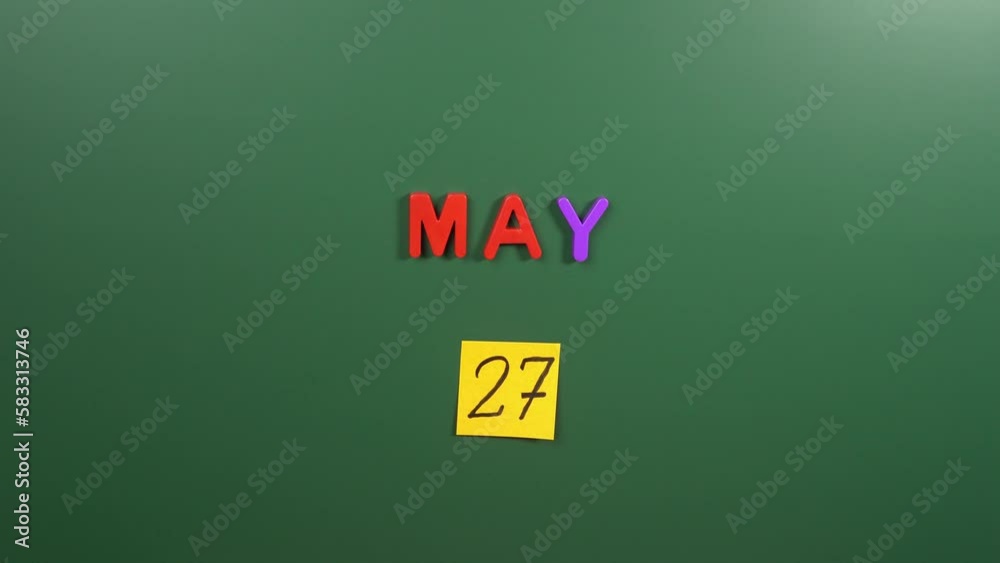 Hand sticking a sticker 27 May calendar day on school board. 27 date of May. Twenty seventh day of May. 27th date number. 27 day calendar. Twenty seven date. National Dont Fry Hand sticking a sticker 27 May calendar day on school board. 27 date of May. Twenty seventh day of May. 27th date number. 27 day calendar. Twenty seven date. National Dont Fry