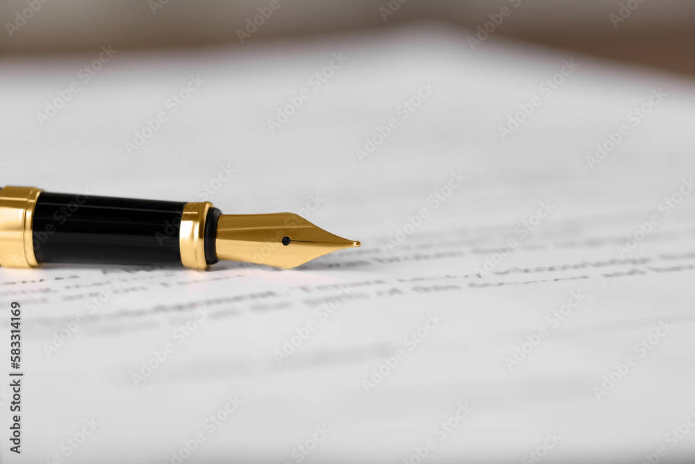 Fountain pen on document, closeup and space for text. Notary contract Fountain pen on document, closeup and space for text. Notary contract