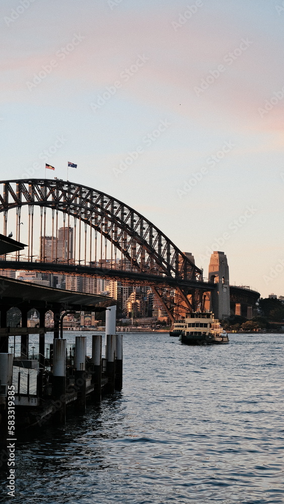Sydney city harbour bridge at sunset