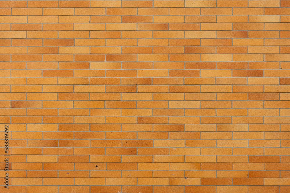 An abstract image of the reddish brown texture on an exterior brick wall. An abstract image of the reddish brown texture on an exterior brick wall.