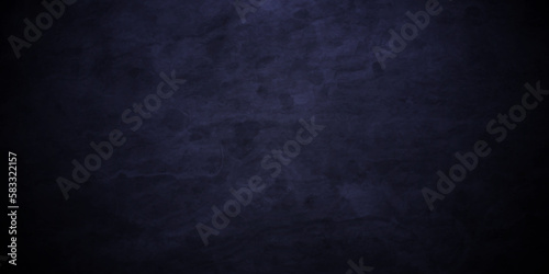 Dark blue grunge background texture with black vignette in old vintage textured backdrop border design. Dark Blue Stucco Texture Background. © MdLothfor