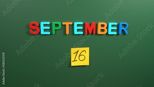 Wallpaper Mural Hand sticking a sticker 16 September calendar day on school board. 16 date of September. Sixteenth day of September. 16th date number. 16 day calendar. Sixteen date. Mexico Independence, world ozone Torontodigital.ca