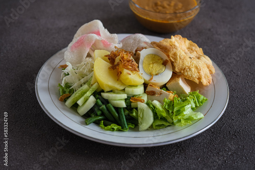 gado-gado, Indonesian salad is mixed vegetables with peanut sauce photo