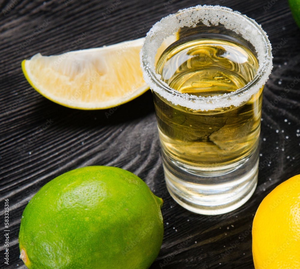 Tequila drink served in glasses with lime and salt Tequila drink served in glasses with lime and salt