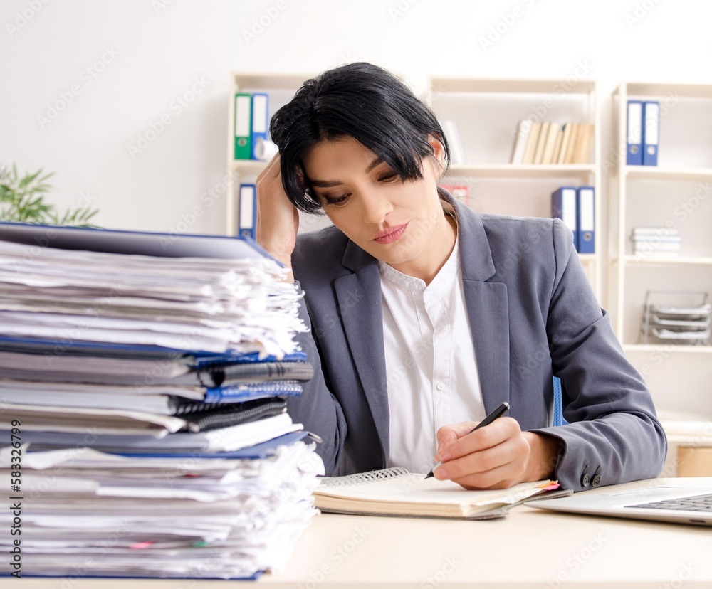 Middle aged businesslady unhappy with excessive work Middle aged businesslady unhappy with excessive work