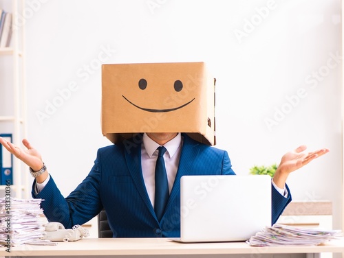 Fotografija Happy man employee with box instead of his head
