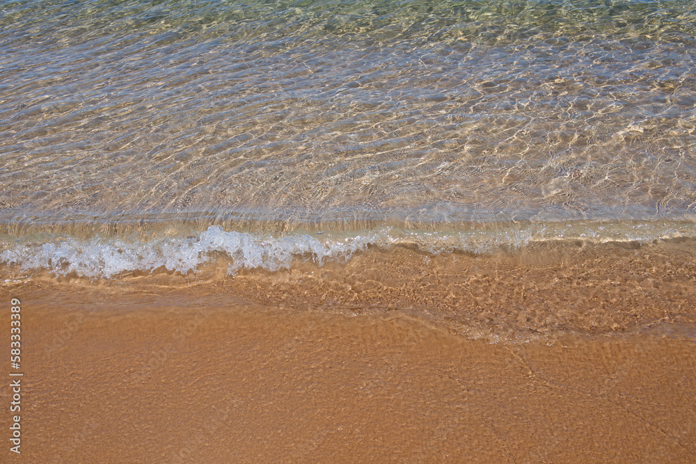 Beach with golden sand, turquoise ocean water. Panoramic sea view. Natural background for summer vacation. Beach with golden sand, turquoise ocean water. Panoramic sea view. Natural background for summer vacation.