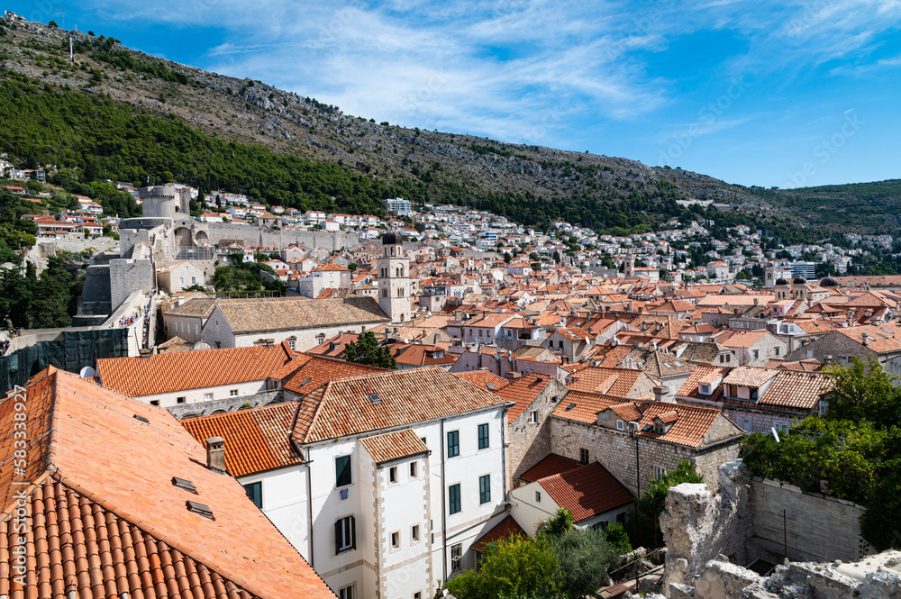 Photo of part of the old town of Dubronik, Croatia from the high walls surrounding it. The medieval city is a remarkably well-preserved UNESCO site.