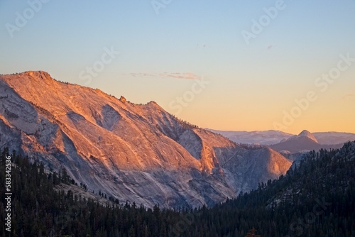 Sunset falls over the high country of Yosemite, where California Highway 120 connects the Central Valley of California on the western side with the Eastern Sierra to the east. © Andrew