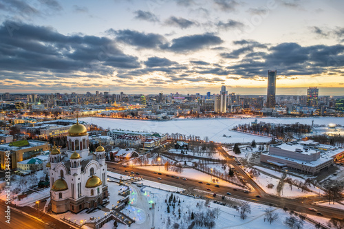 Winter Yekaterinburg and Temple on Blood in beautiful cloudy sunset. Aerial view of Yekaterinburg  Russia. Translation of the text on the temple  Honest to the Lord is the death of His saints.