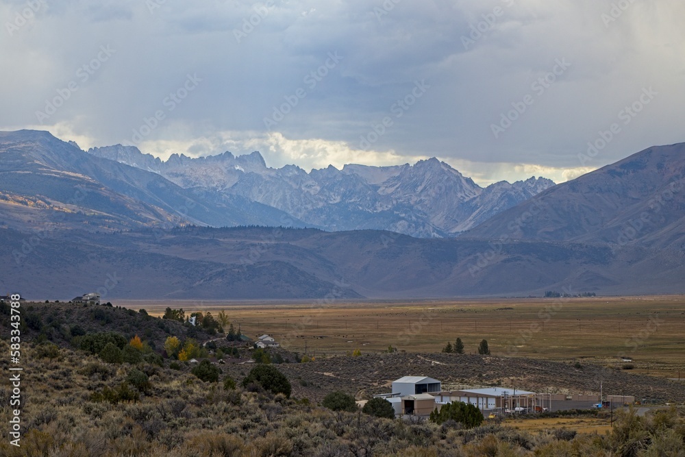 Sharp peaks rise over the Eastern Sierra, a region at the base of the steep eastern side of the Sierra Nevadas, as seen from the Travertine Hot Springs.