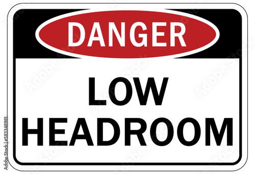 Low headroom warning sign and labels photo