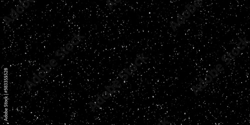 Flying dust particles on a black background. Starry nigh sky galaxy space background.