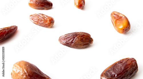 Dried dates isolated on white background.