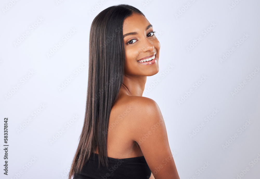 Portrait, beauty and Indian woman with hair care, texture and happiness against grey studio background. Face, female and lady with cosmetics, luxury and salon treatment for shine, glow and self care Portrait, beauty and Indian woman with hair care, texture and happiness against grey studio background. Face, female and lady with cosmetics, luxury and salon treatment for shine, glow and self care