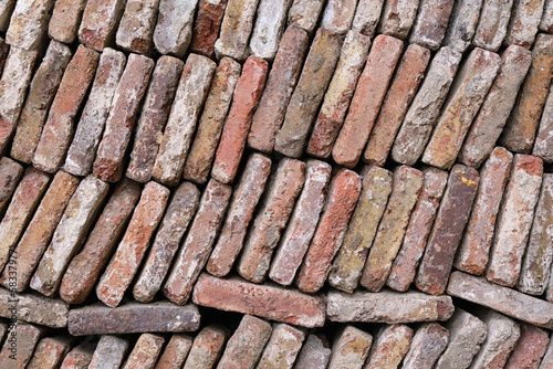 Beautiful background a large lot of old vintage bricks for the restoration.