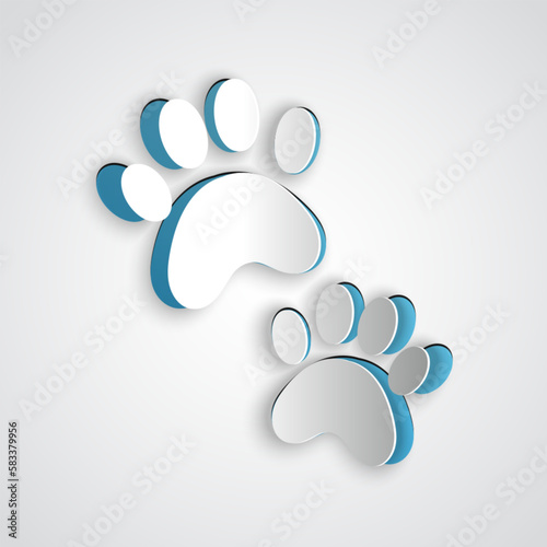 Paper cut Paw print icon isolated on grey background. Dog or cat paw print. Animal track. Paper art style. Vector