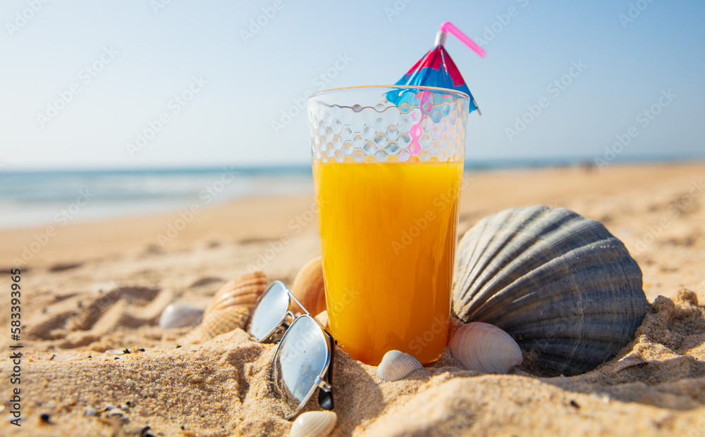 Fruit juice cocktail on the beach