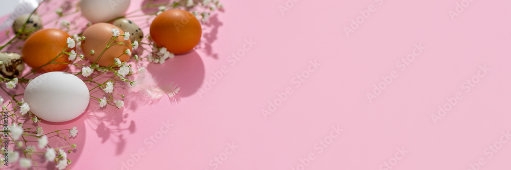 Easter web site design, banner with copy space, aesthetic natural color eggs and flowers on pink background