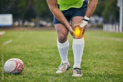 Rugby, pain and man with knee injury on sports field for practice match, training and game outdoors. Medical emergency, accident and athlete with x ray of joint inflammation, sprain and tendinitis