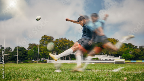 Принти на полотні Rugby, blur and man kicking ball to score goal on field at game, match or practice workout