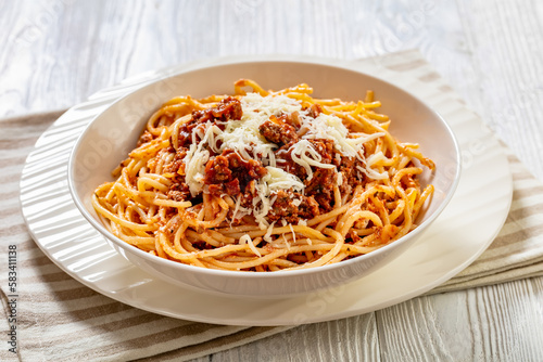 spaghetti al ragu alla Bolognese in white bowl photo