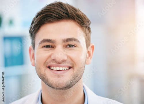 Smile, doctor face and portrait of man in hospital with for wellness, medicine and medical care. Healthcare, headshot and closeup of happy health worker in clinic for consulting, trust and mockup