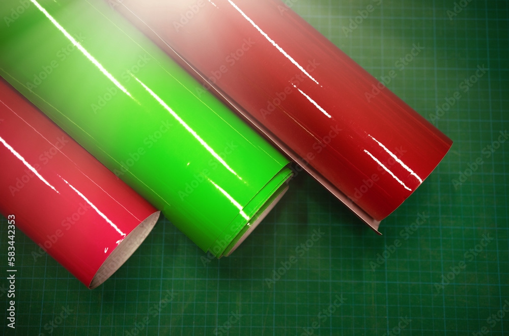 Vinyl selfadhesive film on the table. Visual design of shop windows