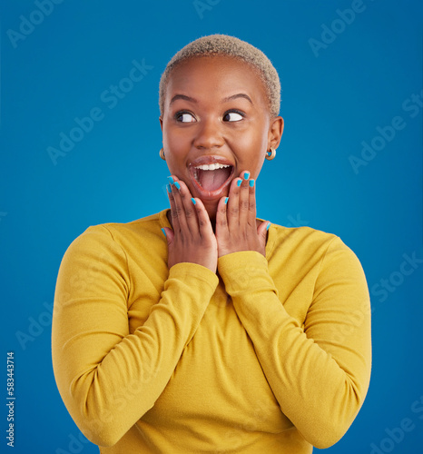 Fotografie Black woman, happy and surprise face in studio for fashion, youth or notification by blue background