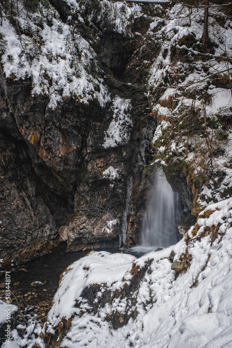 Winter view on Pison waterfall in Dimaro  Autonomous Province of Trento  in the northern Italy. January 2023. Long exposure picture