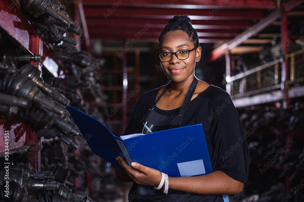 woman African American warehouse inspector wear spectacles crossed arms ...