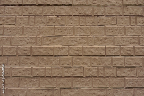 Background - light brown painted brick veneer wall