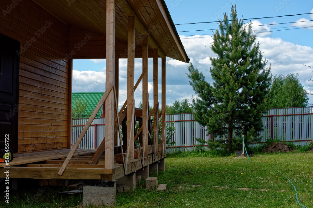 construction of wooden extensions of a rural house construction of wooden extensions of a rural house