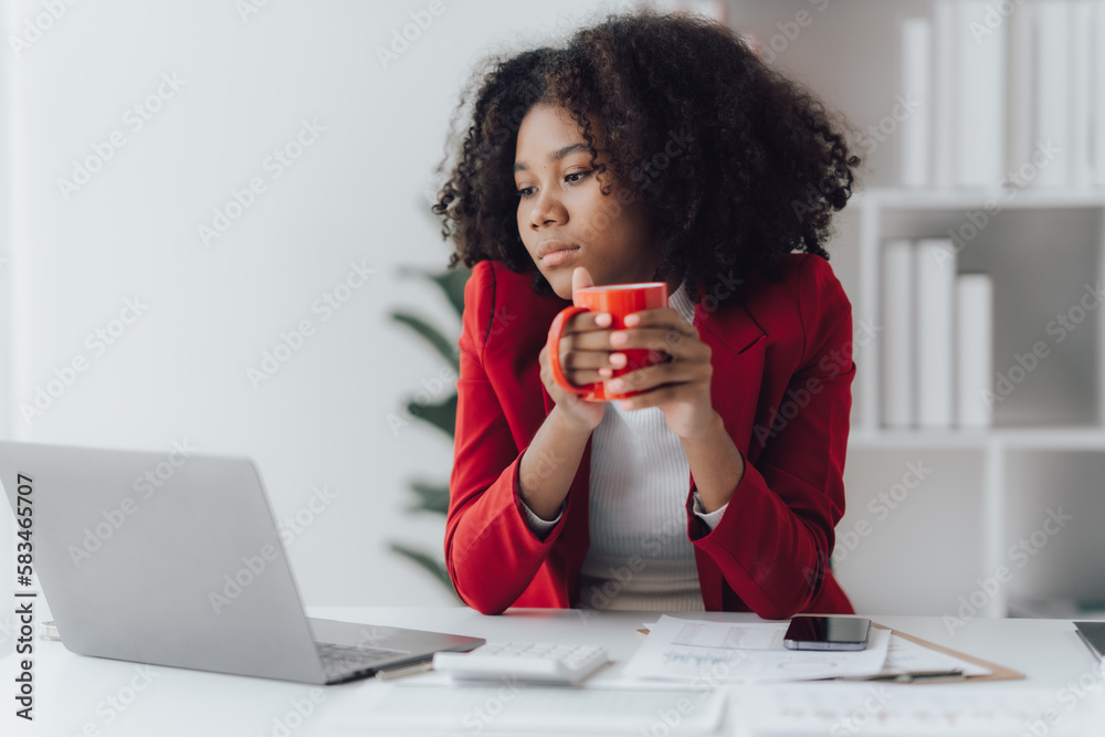 Young business woman worried about problem at work and stressed about problem with laptop computer. Young business woman worried about problem at work and stressed about problem with laptop computer.