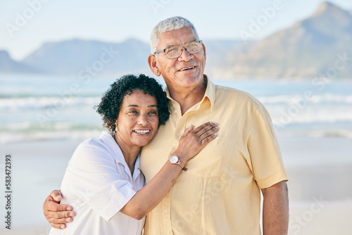 Senior couple at beach, hug and smile with travel, retirement and love outdoor, vacation with view and relax in nature. Peace, zen and tropical island, man and woman with marriage and happiness
