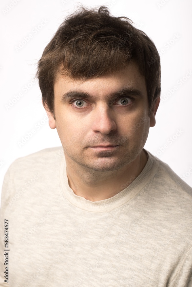 Obraz premium a young man of European appearance. portrait close-up