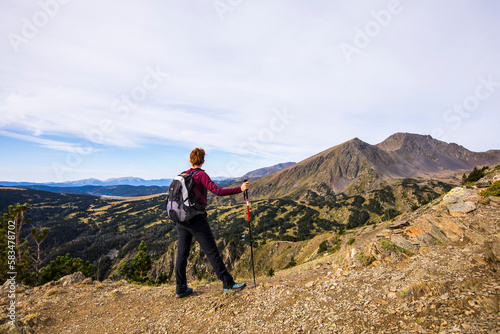 Young hiker girl enjoying in Camporrells, Pyrenees, France