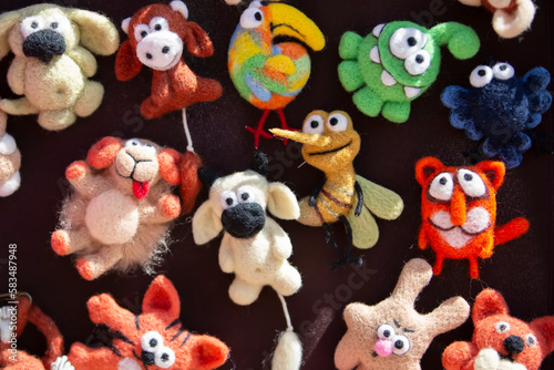 Funny multi-colored felted wool toys.