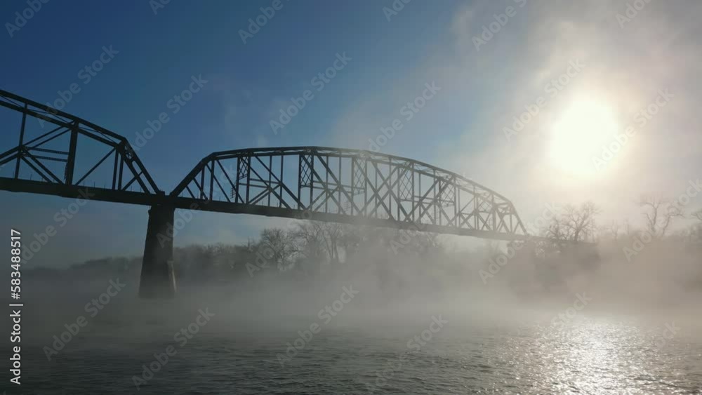Bismarck Rail Bridge, Historic Architecture in North Dakota, Low Angle Orbit Shot Just Above Water Surface Bismarck Rail Bridge, Historic Architecture in North Dakota, Low Angle Orbit Shot Just Above Water Surface