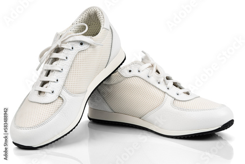 White leather sport sneakers isolated on transparent background with shadow