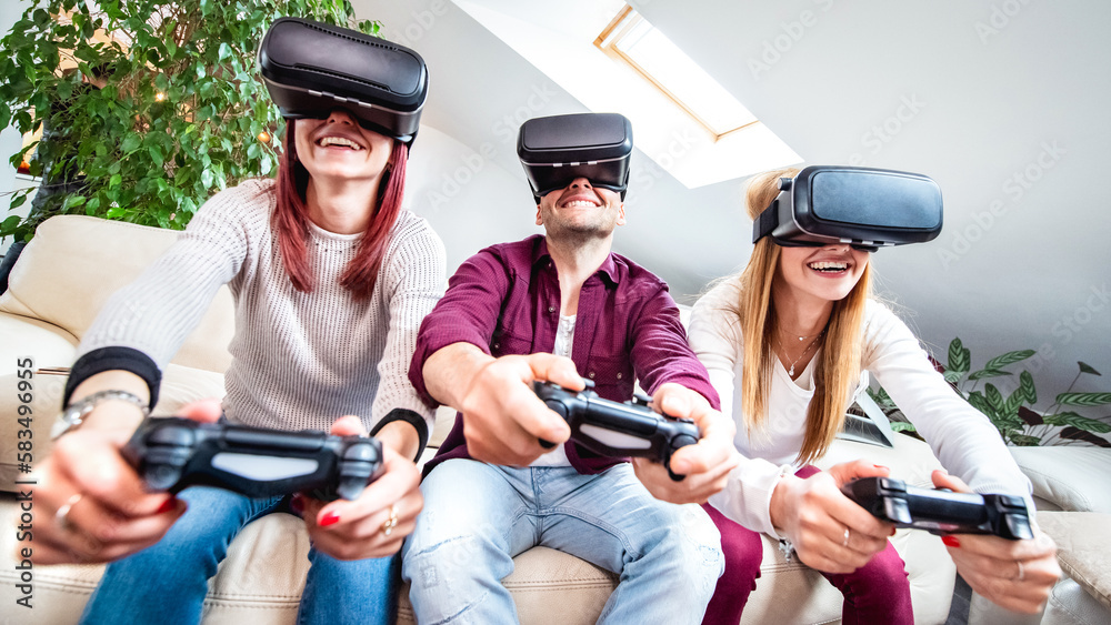 Trendy people playing with vr glasses at shared apartment - Virtual reality and wearable tech concept with happy friends having fun with headset goggles