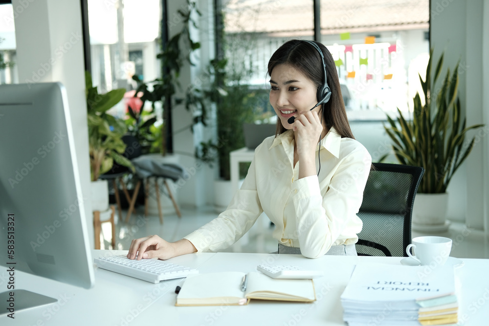 Obraz premium Confident asian businesswoman talking to the camera video calling video conference with his business partners in office.